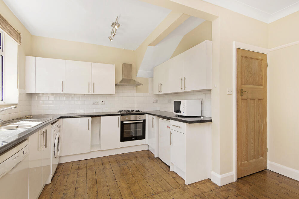 Main image of property: Toynbee Rd, SW20: 4 bed 2 rec 2 bath 
