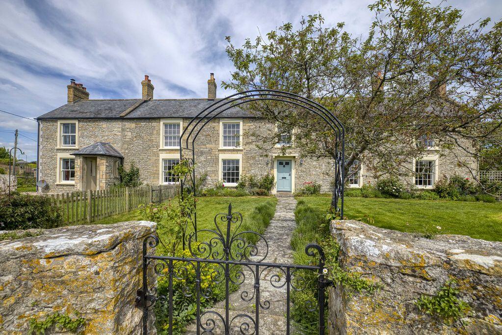 Main image of property: Stunning Georgian Farmhouse in village location