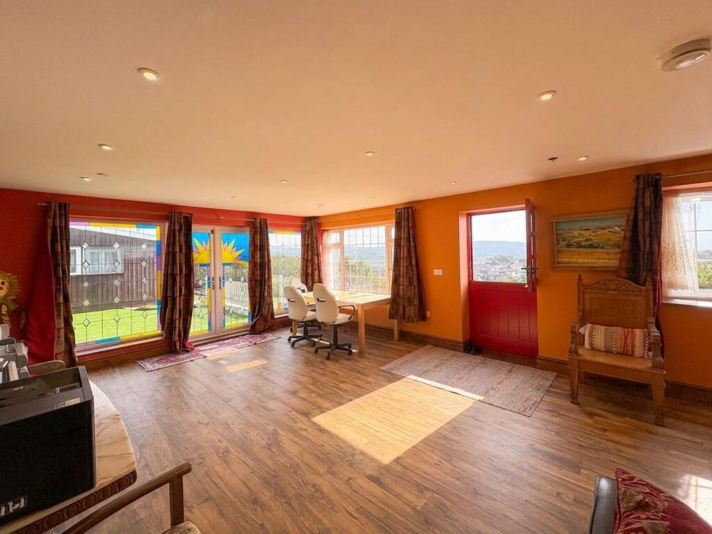House in Swansea - More