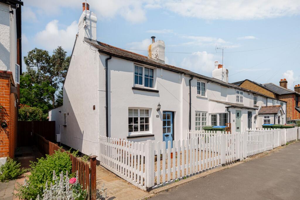 Main image of property: Coverts Road, Claygate, KT10