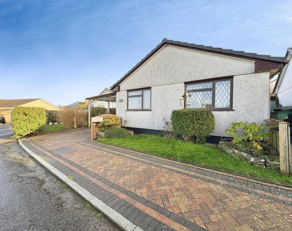 Main image of property: Helston, Charming bungalow with no chain