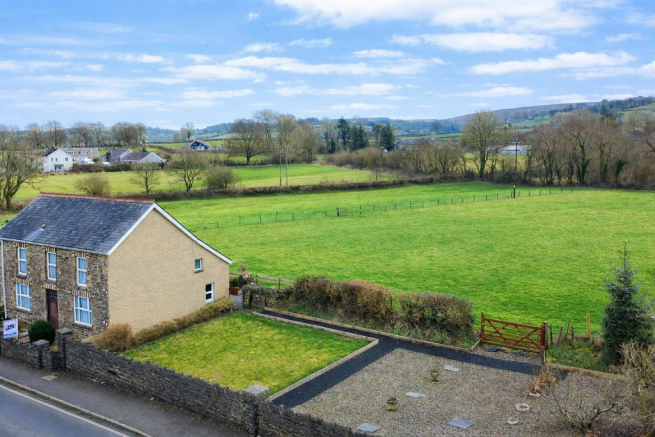 Stone house by the countryside road.png