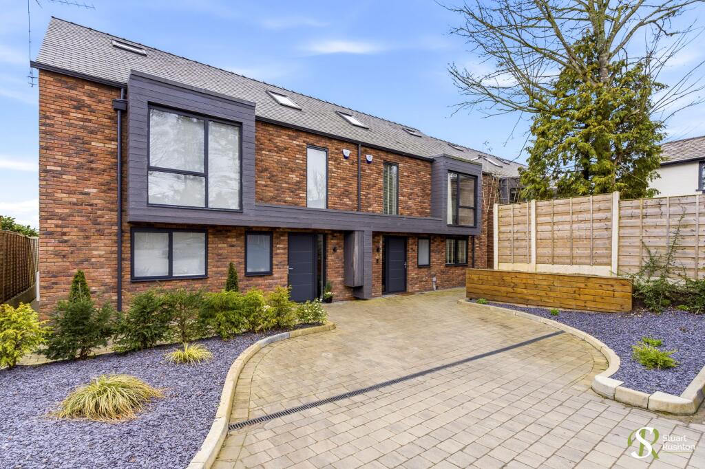 Main image of property: Whim Brook Walk, Wilmslow, SK9