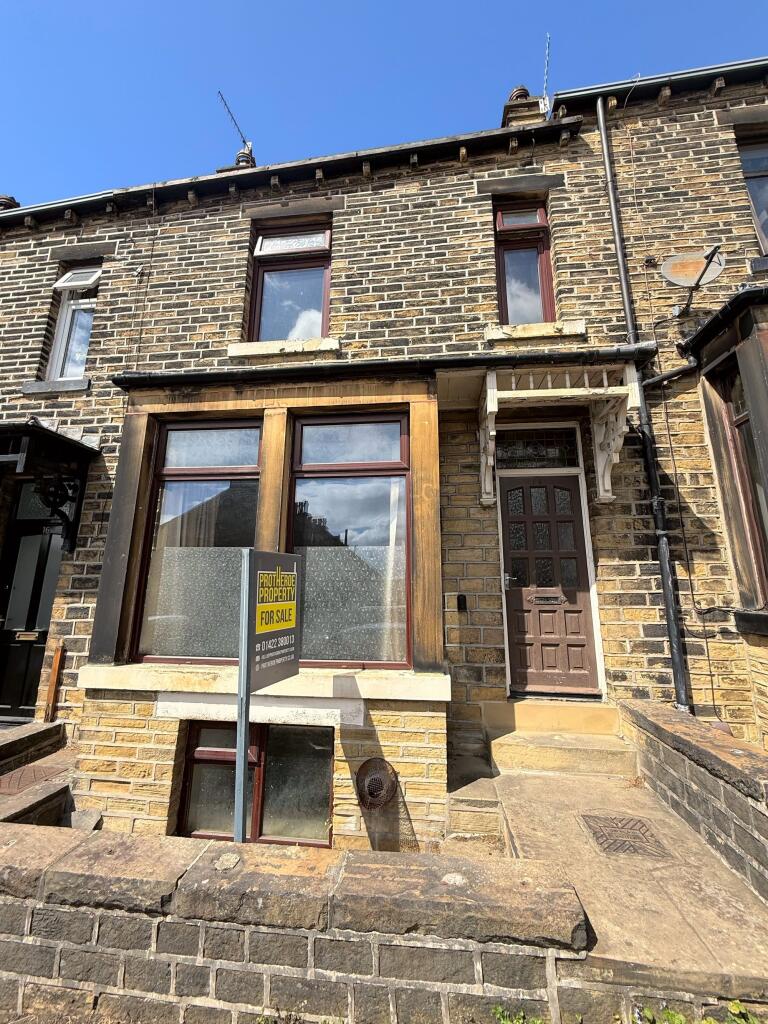 Main image of property: Woodside Grove, Halifax, HX3