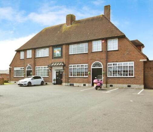 Main image of property: Flat 2 White Hart House, 89 Castle Street, Portchester, Fareham, Hampshire, PO16 9QQ