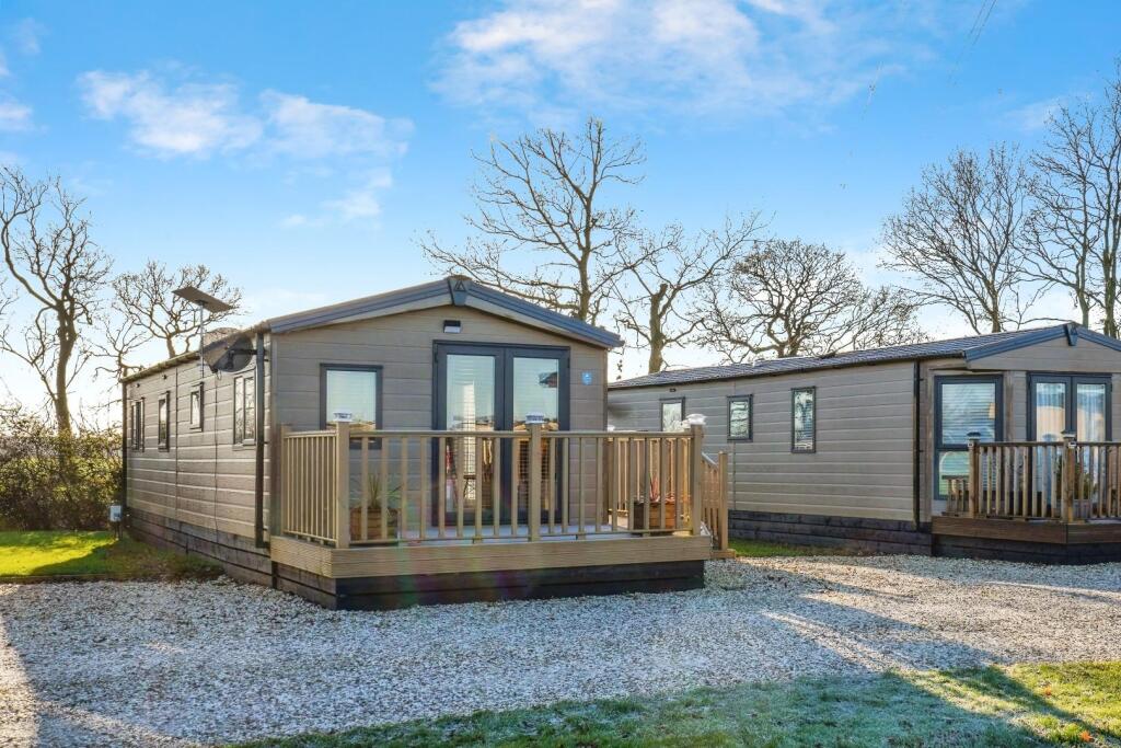 Main image of property: Fine Country Lodges, Street Lane, DN14 7NY