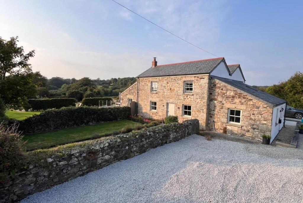 Main image of property: Stunning home, 10 acres and barns with planning permission.