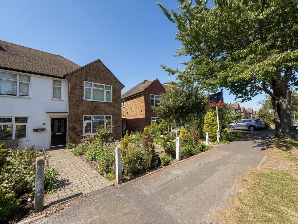 Main image of property: Effingham Close, SUTTON