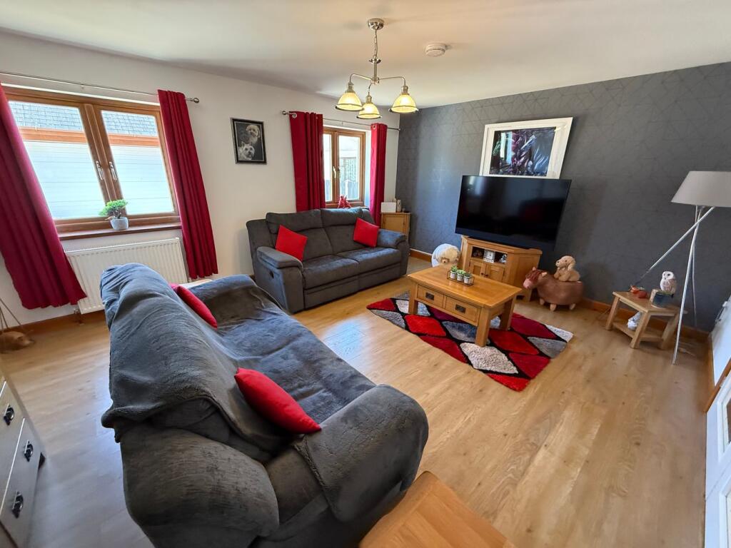 House in Swansea - More
