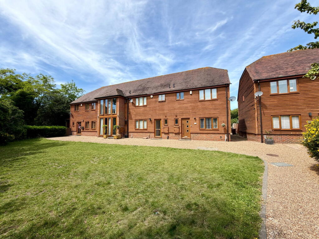 Main image of property: A beautiful barn style property set in a rustic private development