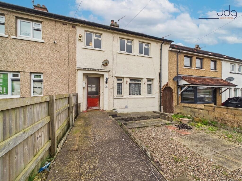 Main image of property: Bowland Road, Heysham | Three bedroom house backing on to playing fields in need of updating