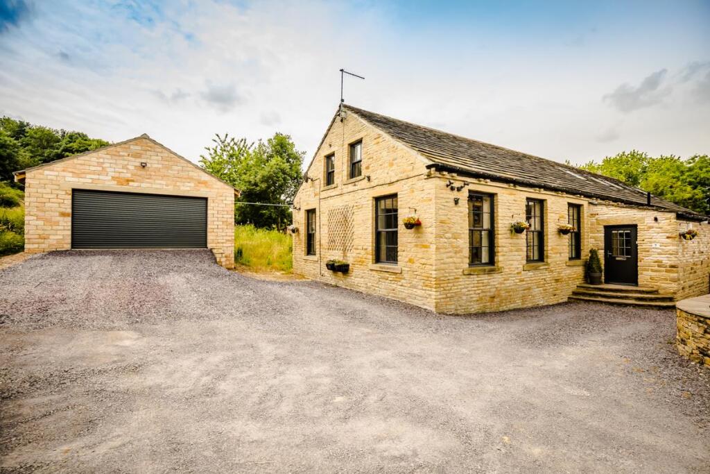 Main image of property: The Old Mill House, Brighouse.