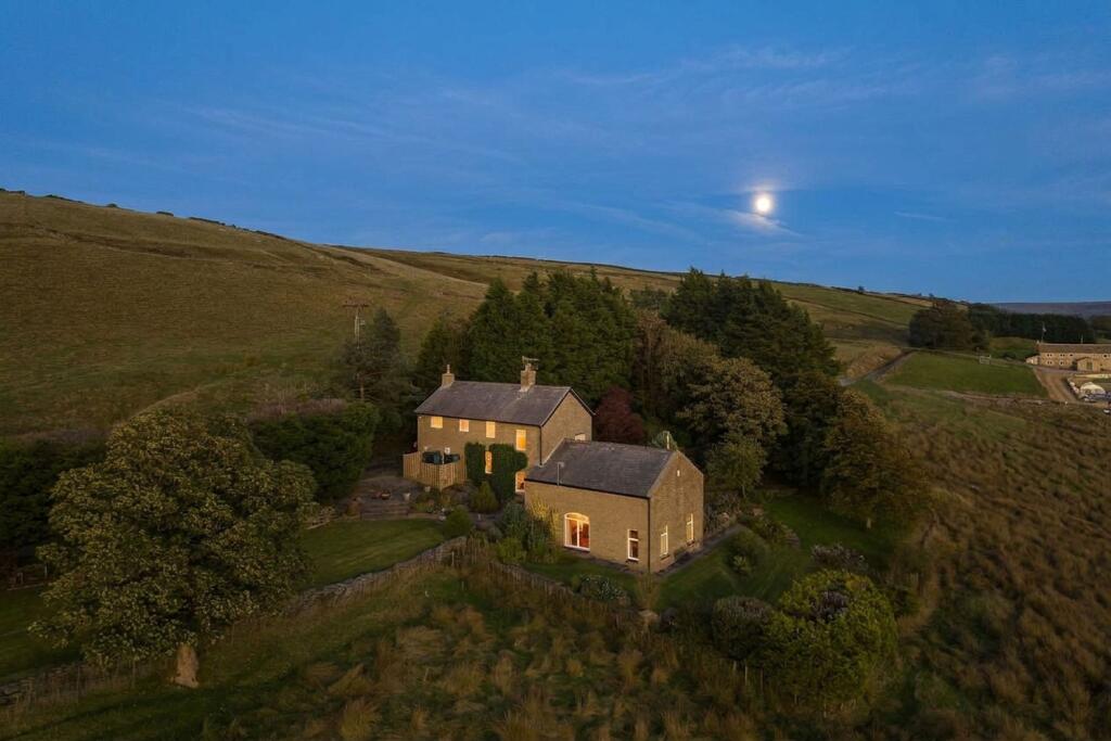 Main image of property: Heightside Lane, Rossendale, BB4 | 4-Bed Stone Farmhouse with Panoramic Views Across the Rossendale Valley