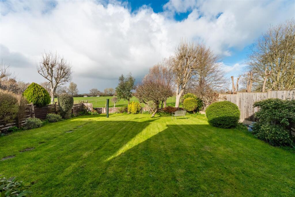 A charming four bedroom family home backing onto open playing fields in Yatton photo 2