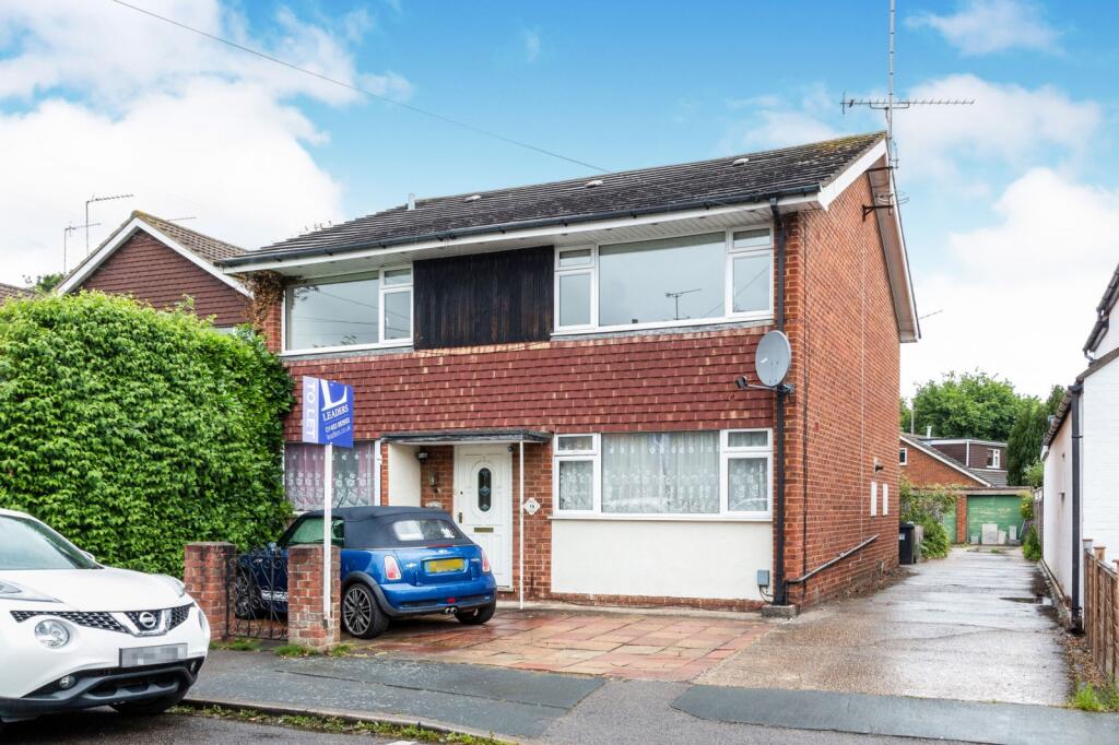 Main image of property: Abbey Road, Woking, GU21