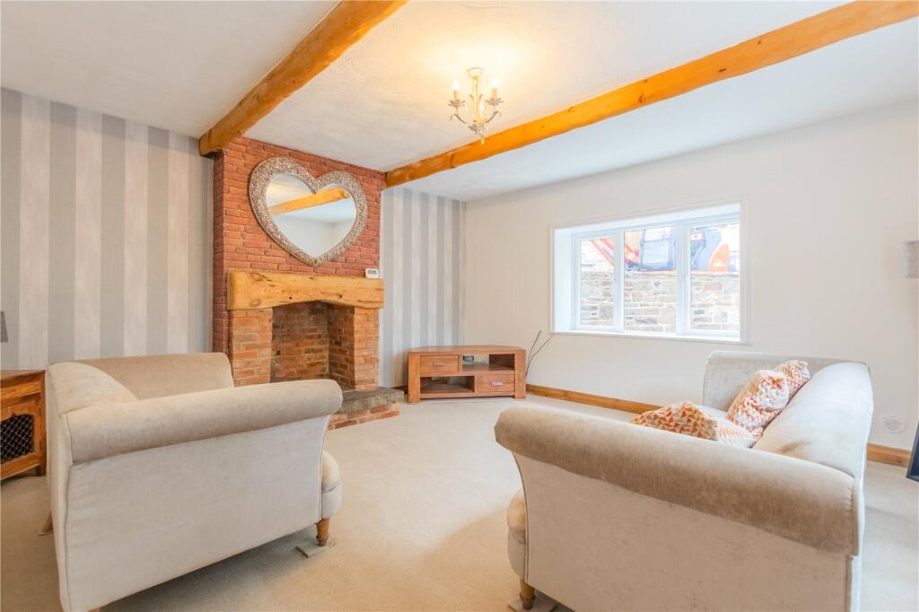 Main image of property: Garden Cottage, Whitworth, Rochdale, Lancashire, OL12
