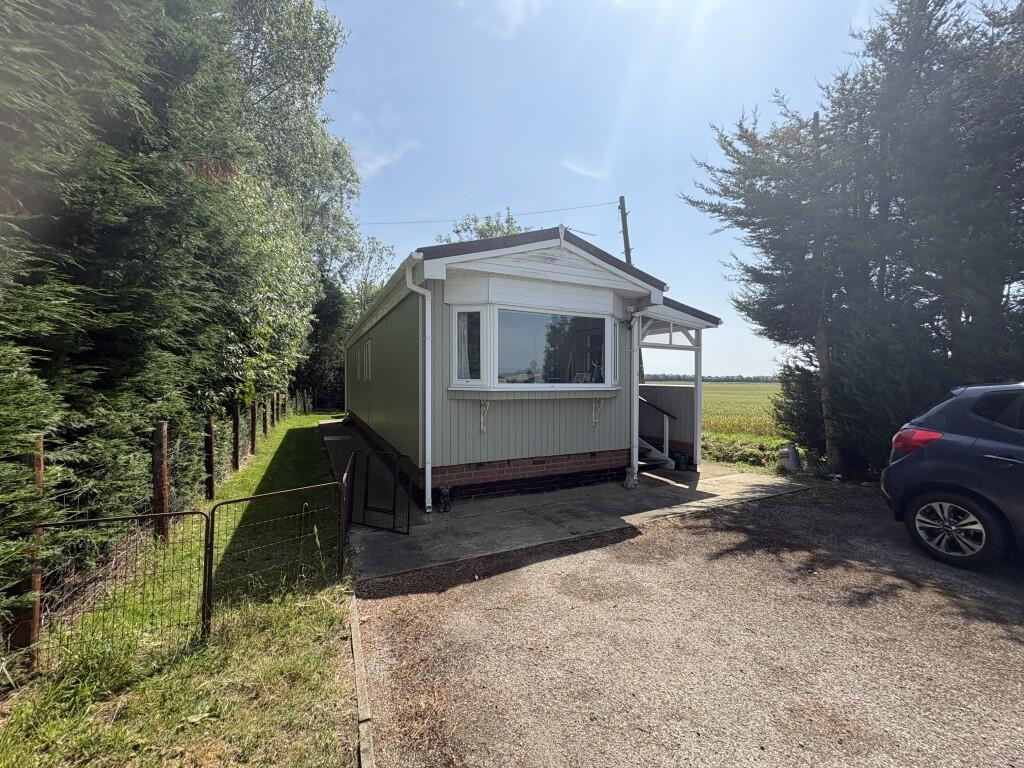 Main image of property: Vanda, Holbeach Drove Gate, Holbeach Drove, Spalding, Lincolnshire PE12 0RX