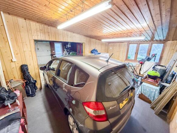 INSIDE VIEW OF GARAGE/WORKSHOP