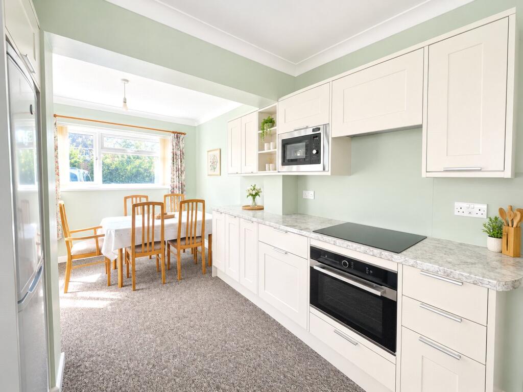Semi detached bungalow benefitting from spacious corner plot location photo 2