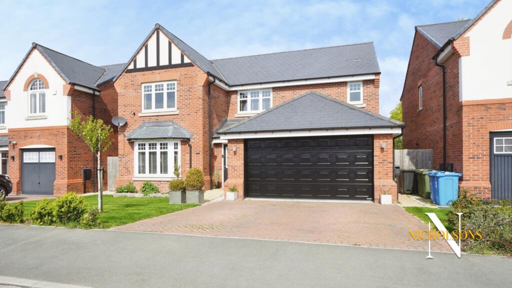 Main image of property: A beautifully presented 4 double bedroom detached family home on Bacopa Drive