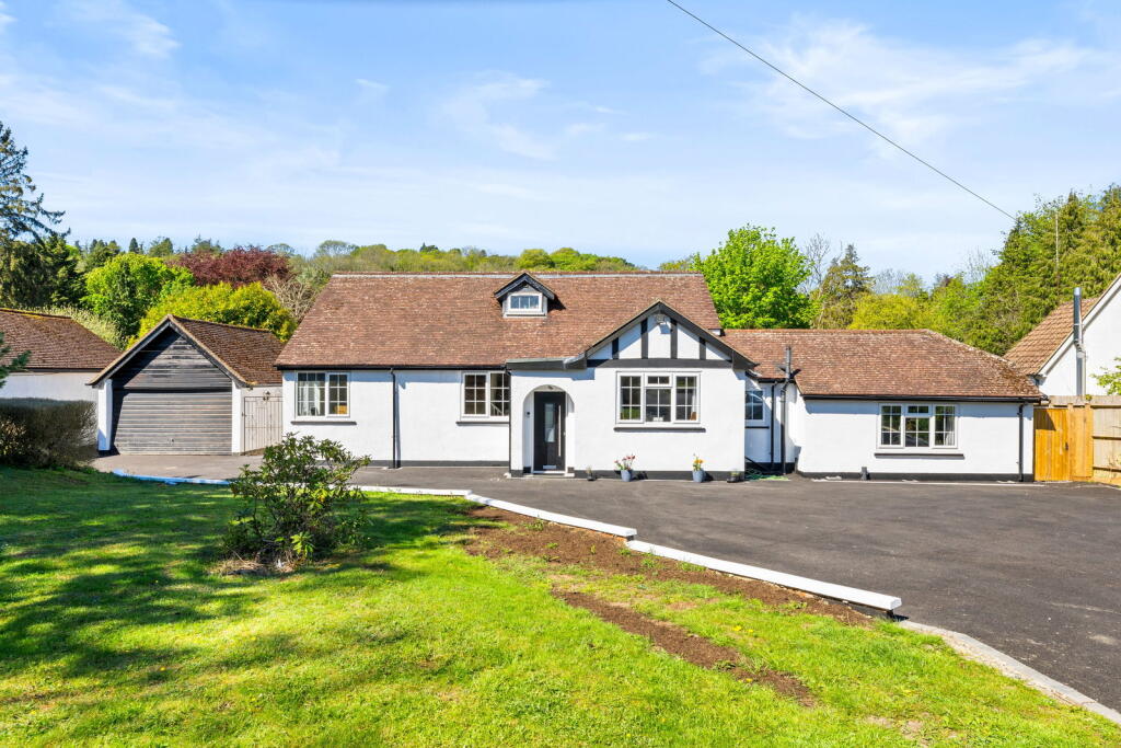Main image of property: Slines Oak Road, Woldingham, Caterham, CR3 7HL