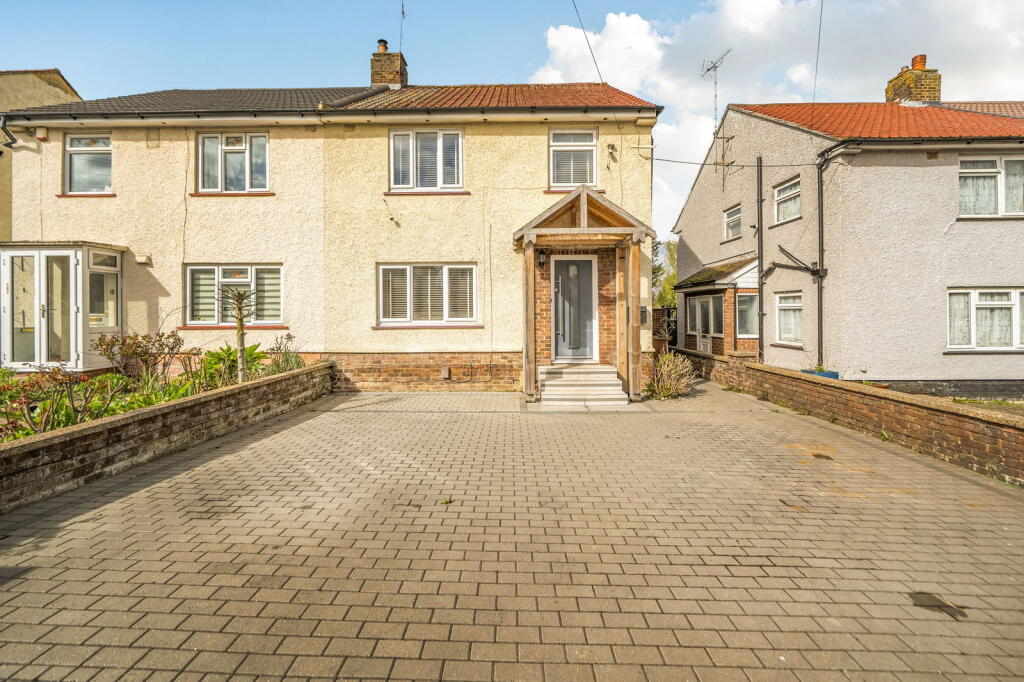 Main image of property: Extended Family Home with Near 100ft West Facing Garden