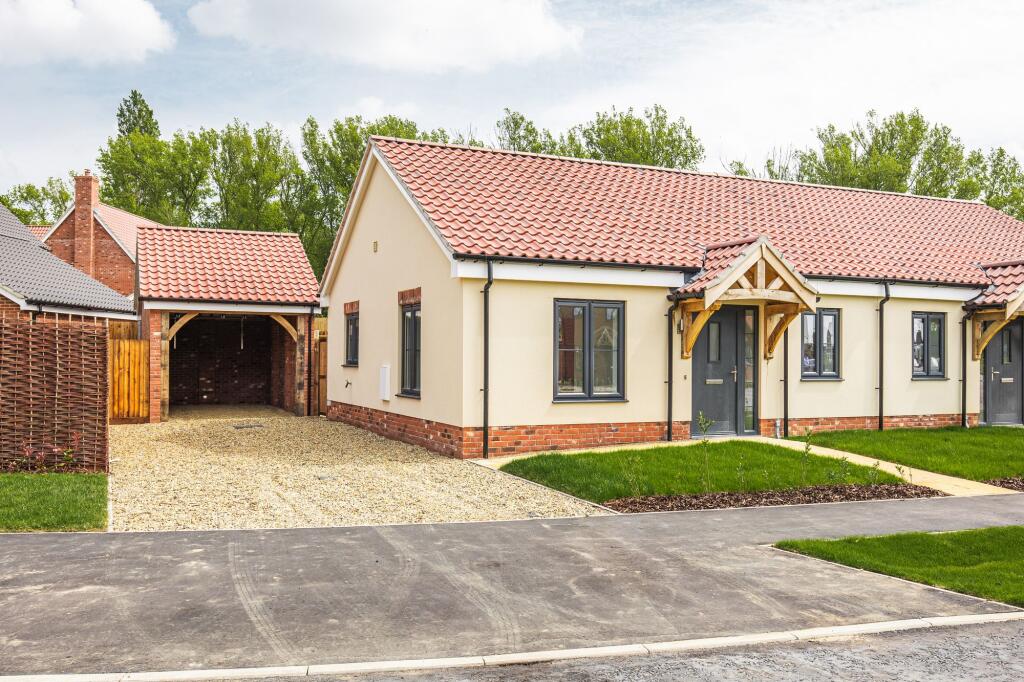 Main image of property: A Charming New Build Bungalow at Manor Green in Hales