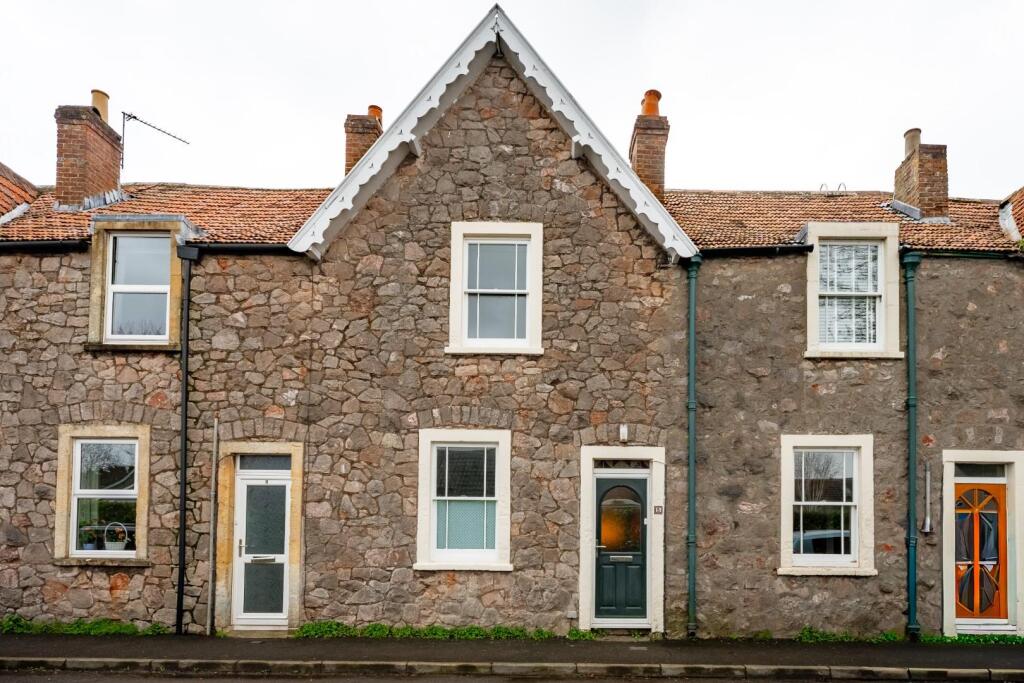 Main image of property: A charming period cottage with beautiful gardens in Wrington