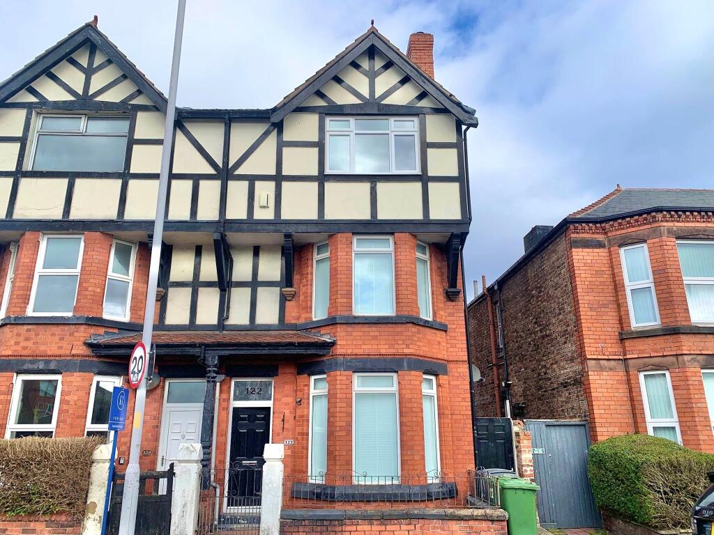 Main image of property: Woodchurch Lane, Prenton, CH42