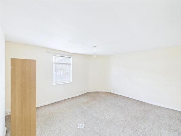 9 - Vacant shop, one-bedroom flat &amp; rear workshop.