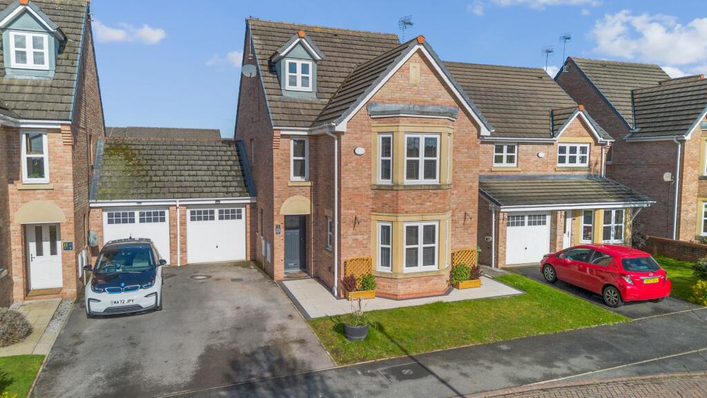 Main image of property: Honeysuckle Avenue, Warrington, WA5