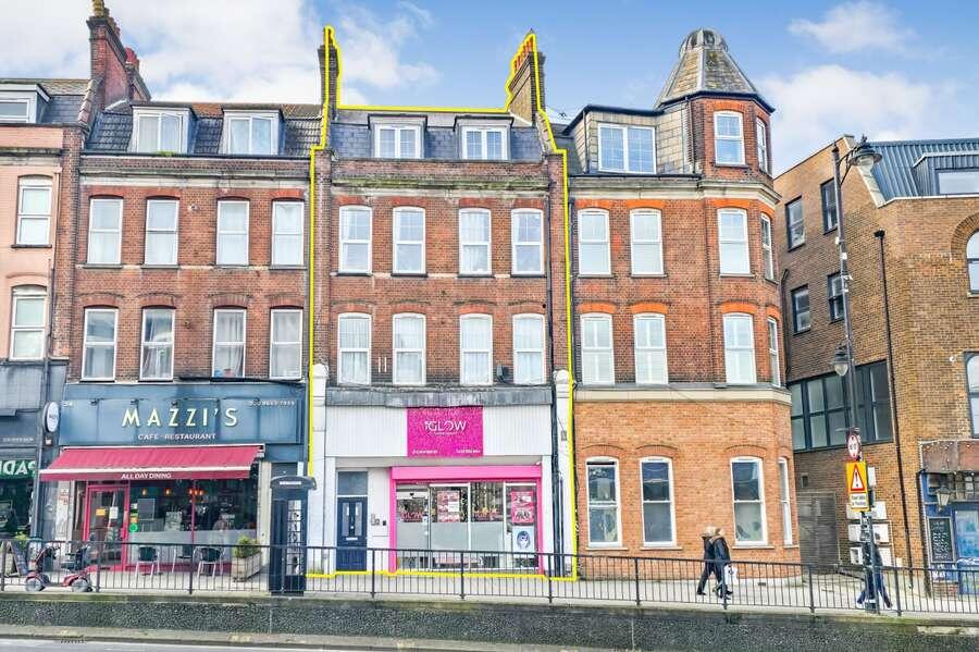 Main image of property: 22 Woodcote Road, Wallington