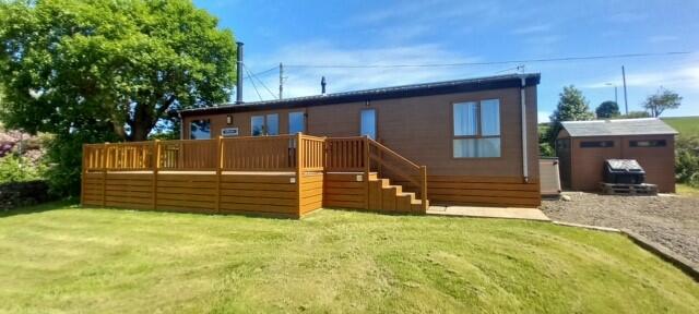 Main image of property: 10 Roseland Lodge Park, Canada Hill, Rothesay, Isle of Bute, PA20 9EH