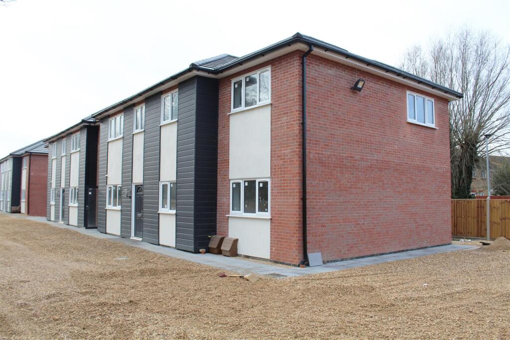 Main image of property: Modern 2-Bed Apartment with Ensuite & Parking | PE1 Location