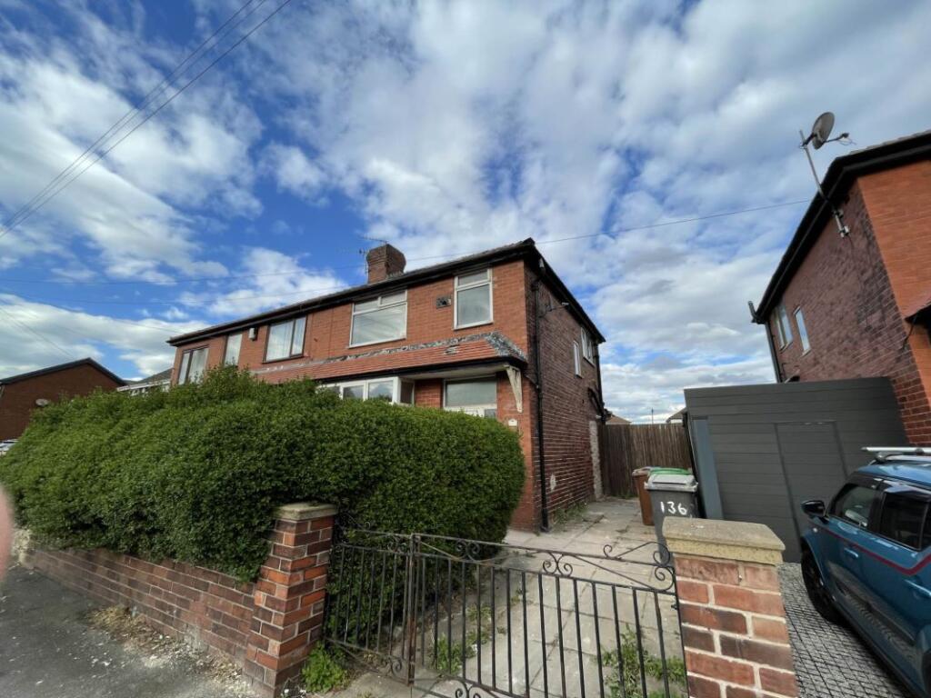 Main image of property: 136 Long Lane, Chadderton, Oldham, Lancashire, OL9 8AZ