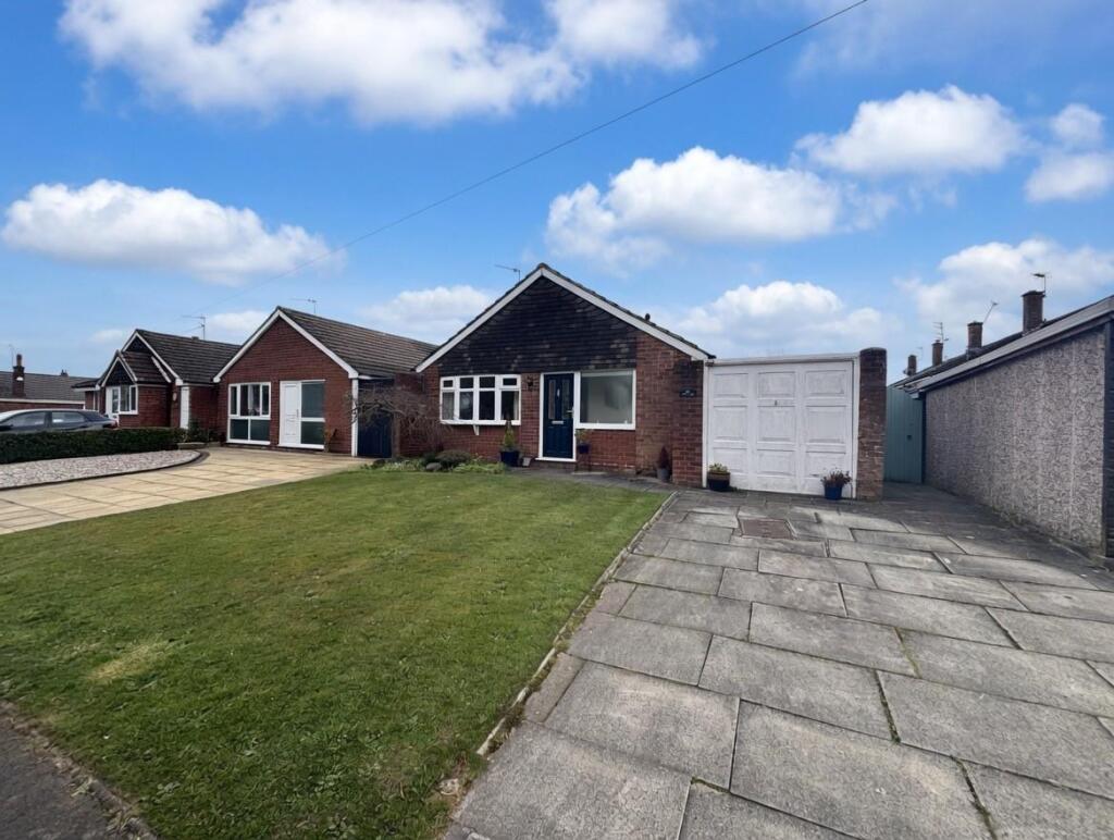 Main image of property: Caldy Road, Handforth, Wilmslow