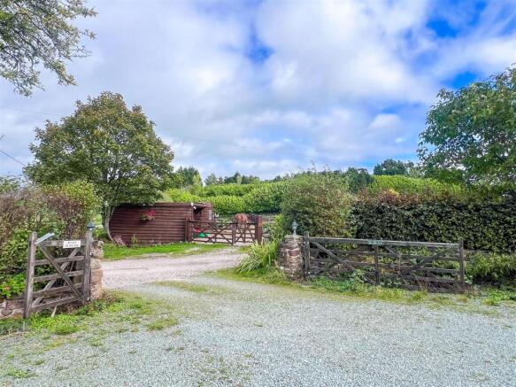 Entrance Gates / Stables Beyond