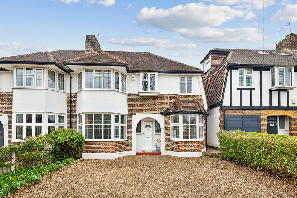 Main image of property: Manor Road North, KT10