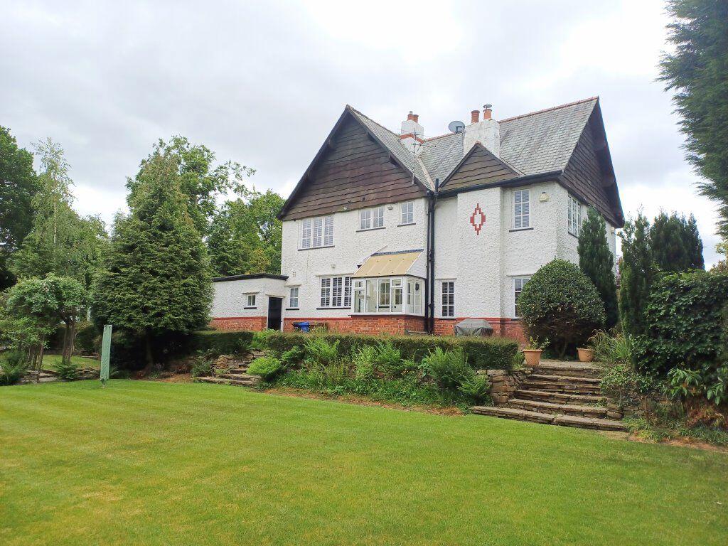 Main image of property: Wych Gate, Robins Ln, Bramhall, SK7 2BN
