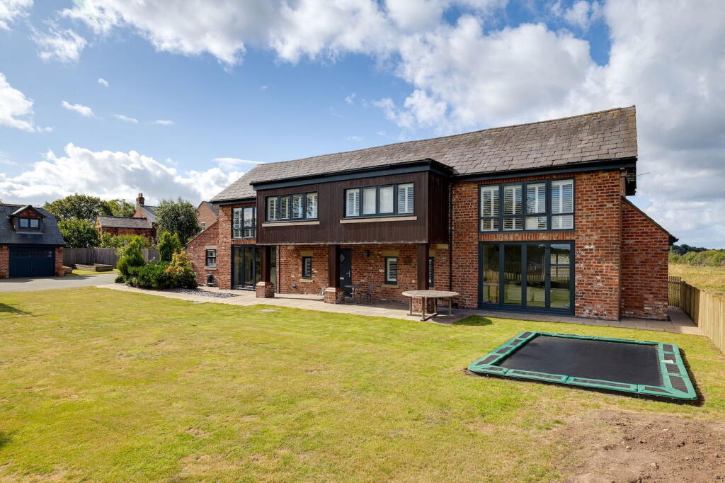 Main image of property: Stunning barn conversion in Daresbury with open views