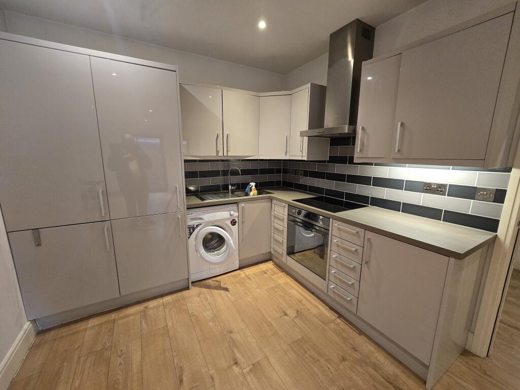 Main image of property: Woburn House, High Street, Addlestone, Surrey
