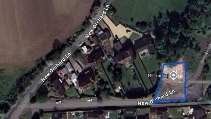 New Orchard Lane aerial photo with blue line.jpeg