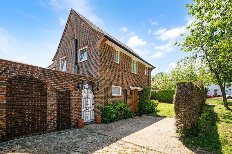Main image of property: Downland Close, Epsom, Surrey, KT18 5SQ