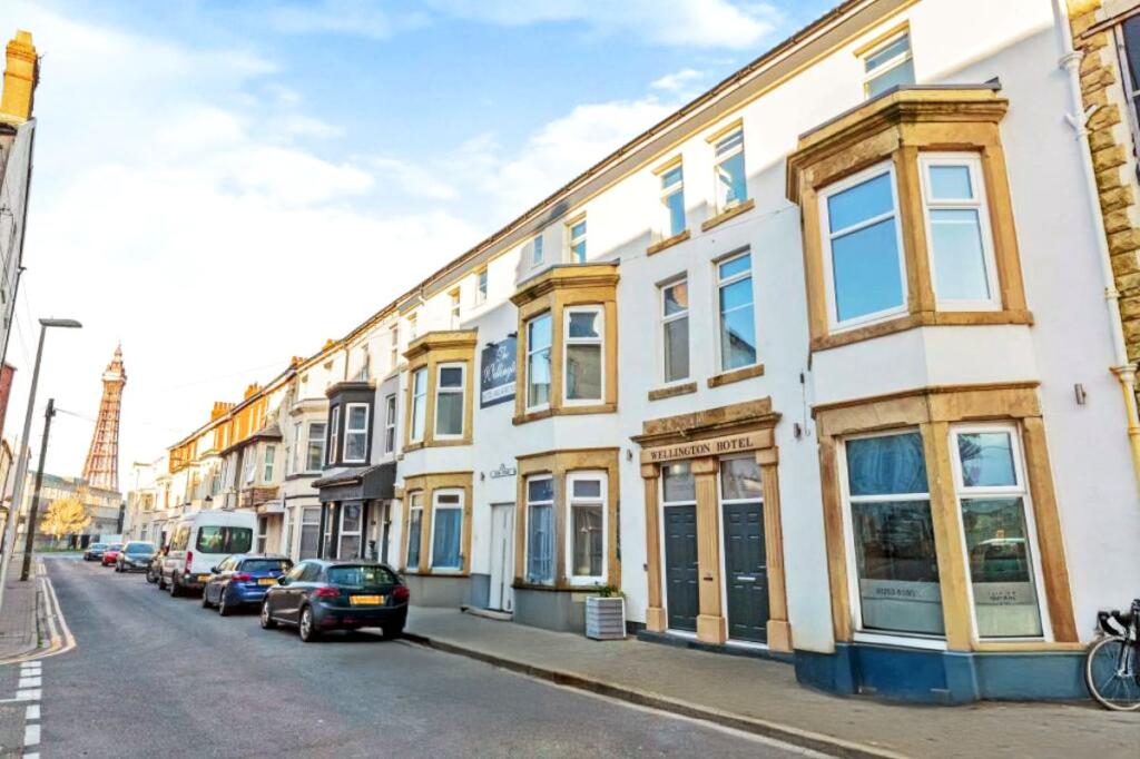 Main image of property: The Wellington Apartments