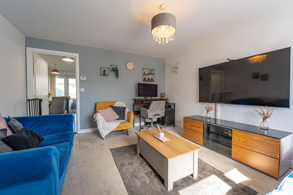 House in Coity - More