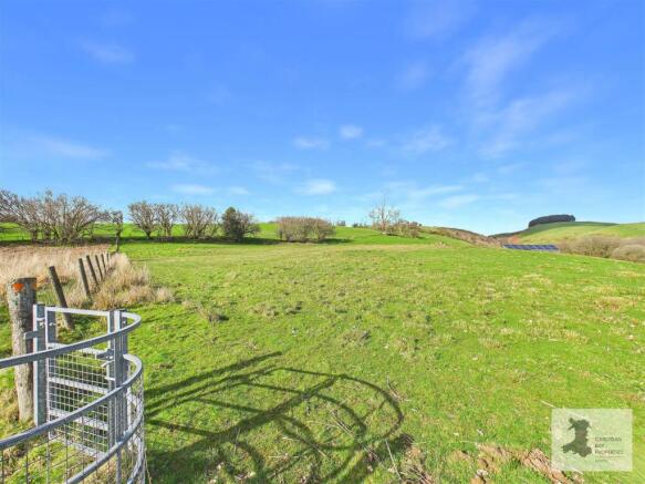 Footpath gate in field