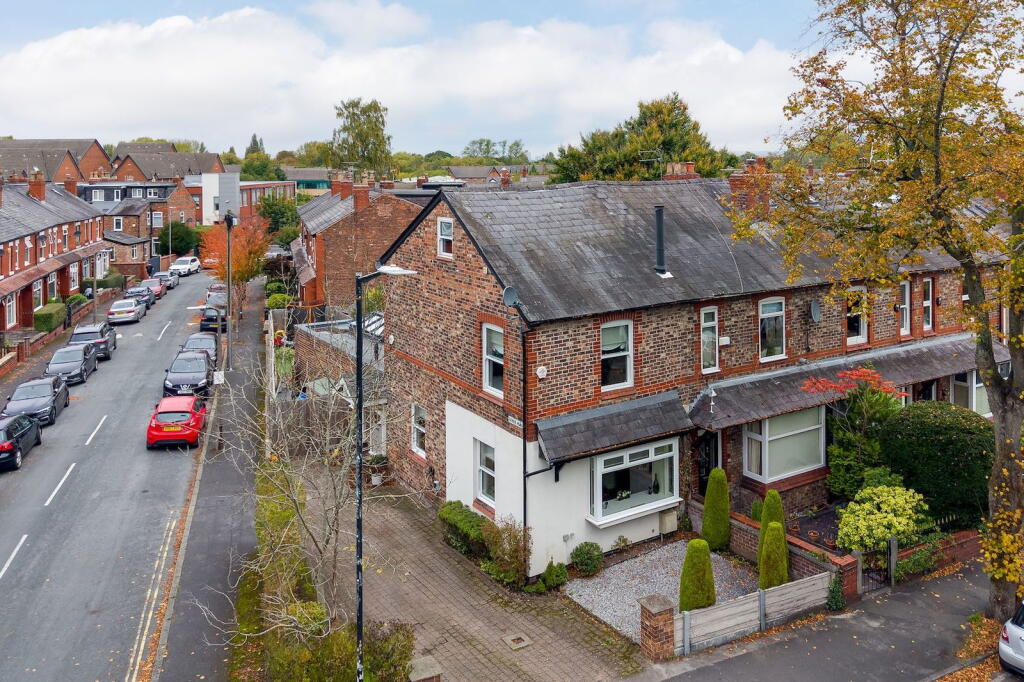 Main image of property: Exceptional extended house with private garden and parking