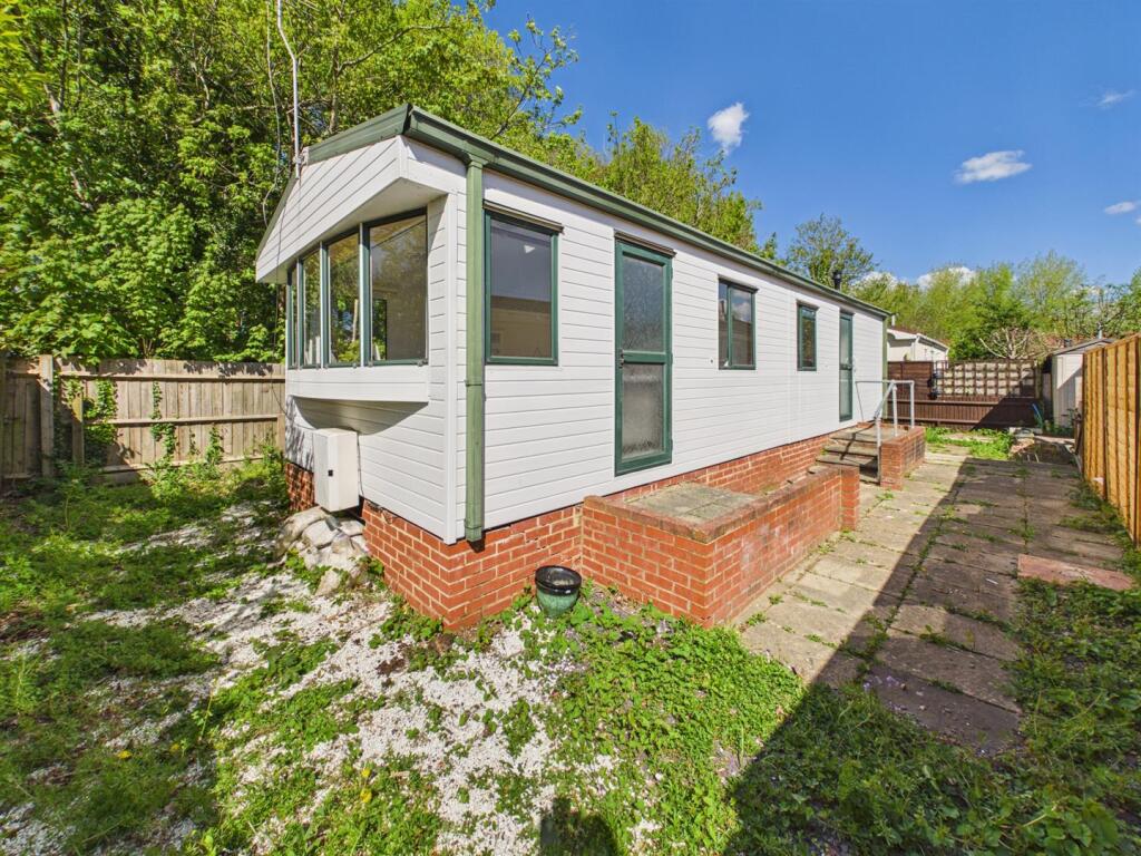 Main image of property: Scours Lane, Tilehurst, Reading