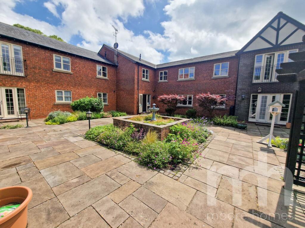 Main image of property: ADLINGTON GRANGE, Hill Top Avenue, Cheadle Hulme SK8 7JA