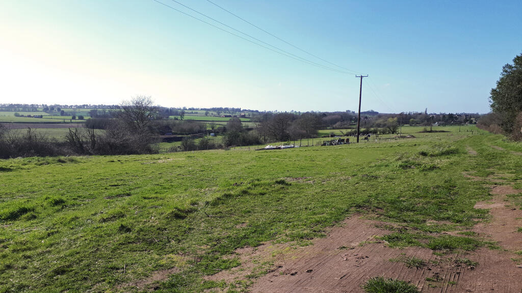 Enclosed in the main by a mature hedgerow &amp; fencing.